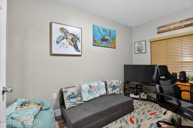 a bathroom with a sink mirror and vanity
