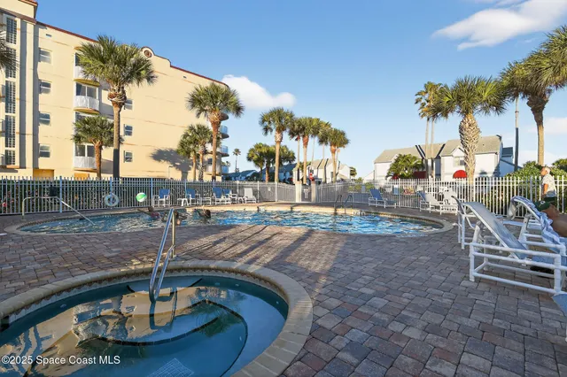 a view of a park with large trees