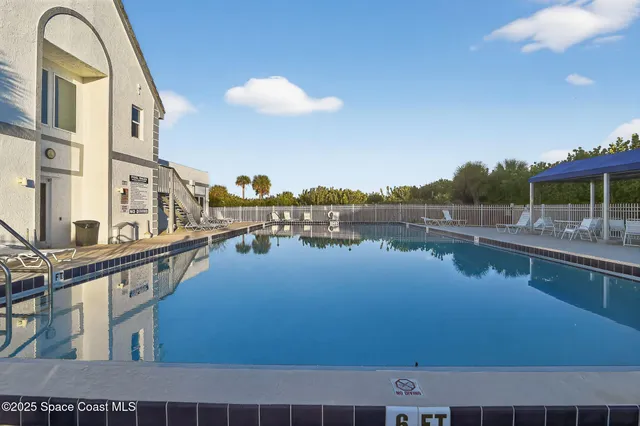 a dining room with furniture and a fireplace