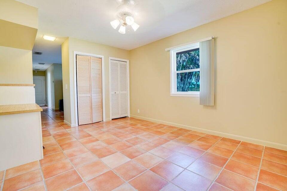 7600 Immokolee Road Fort Pierce, FL 34951 - Photo 24 of 32 a view of an empty room with a window