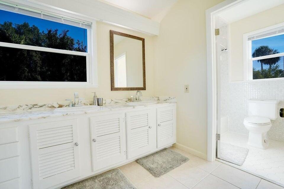 7600 Immokolee Road Fort Pierce, FL 34951 - Photo 30 of 32 a bathroom with a sink and a toilet