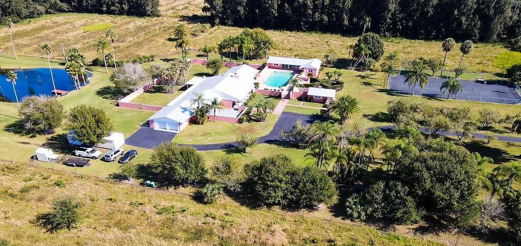 7600 Immokolee Road Fort Pierce, FL 34951 - Photo 3 of 32 a view of yard with outdoor seating