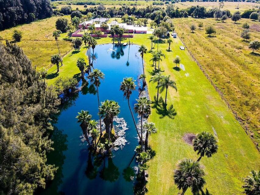 7600 Immokolee Road Fort Pierce, FL 34951 - Photo 4 of 32 a view of a flower around