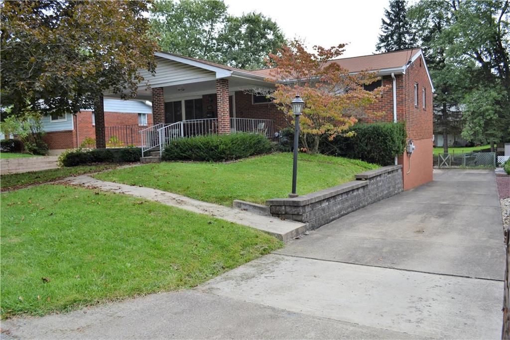 623 Snowball Road Monroeville, PA 15146 - Photo 1 of 23 623 Snowball has a one car integral garage, but the driveway and rear parking pad provide lots of additional off-street parking--for at least four more cars!