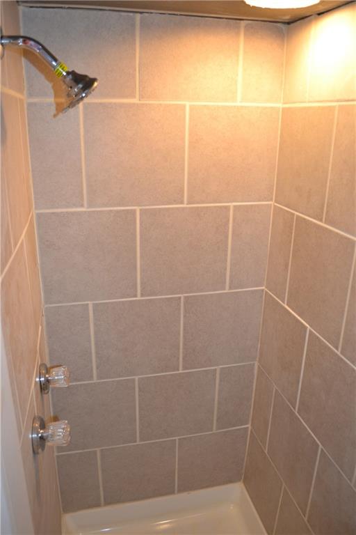 623 Snowball Road Monroeville, PA 15146 - Photo 18 of 23 FULL BATHROOM ON LOWER LEVEL...The full bathroom on the lower level has a beautifully tiled ceramic floor and shower!