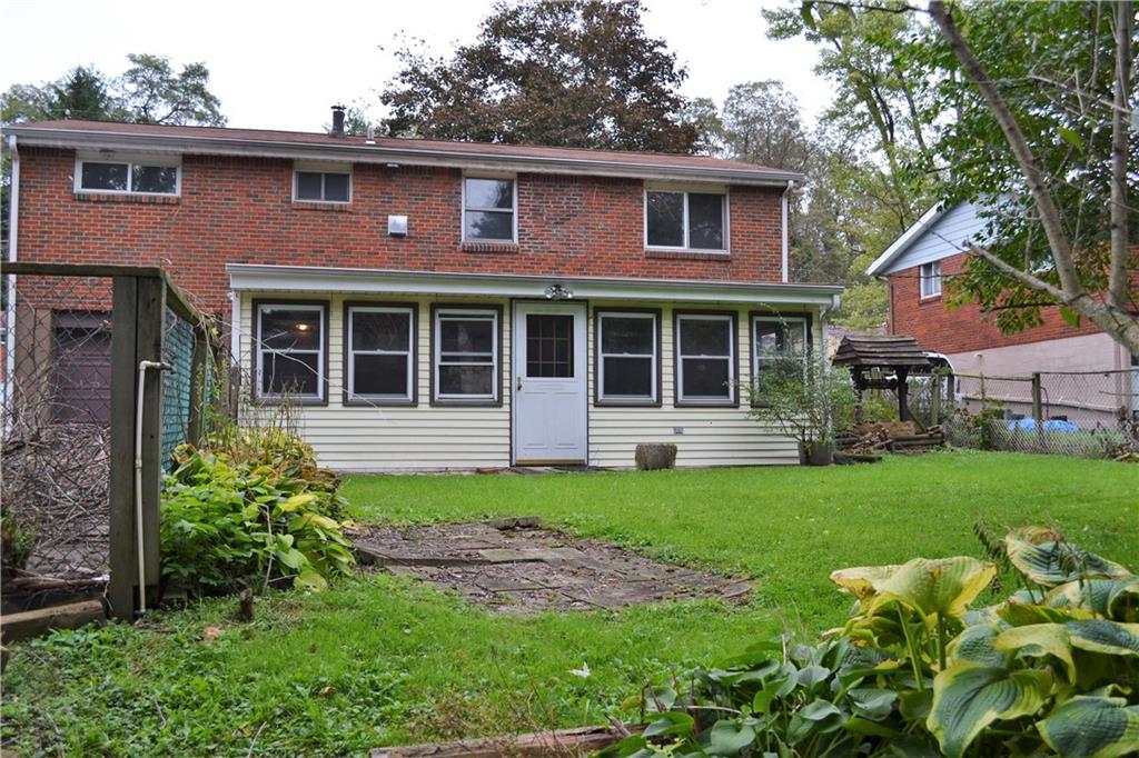 623 Snowball Road Monroeville, PA 15146 - Photo 20 of 23 REAR EXTERIOR: The enclosed three season room has two entrances and lots of windows to let the sunshine in! Great space for lounging, dining or playing!
