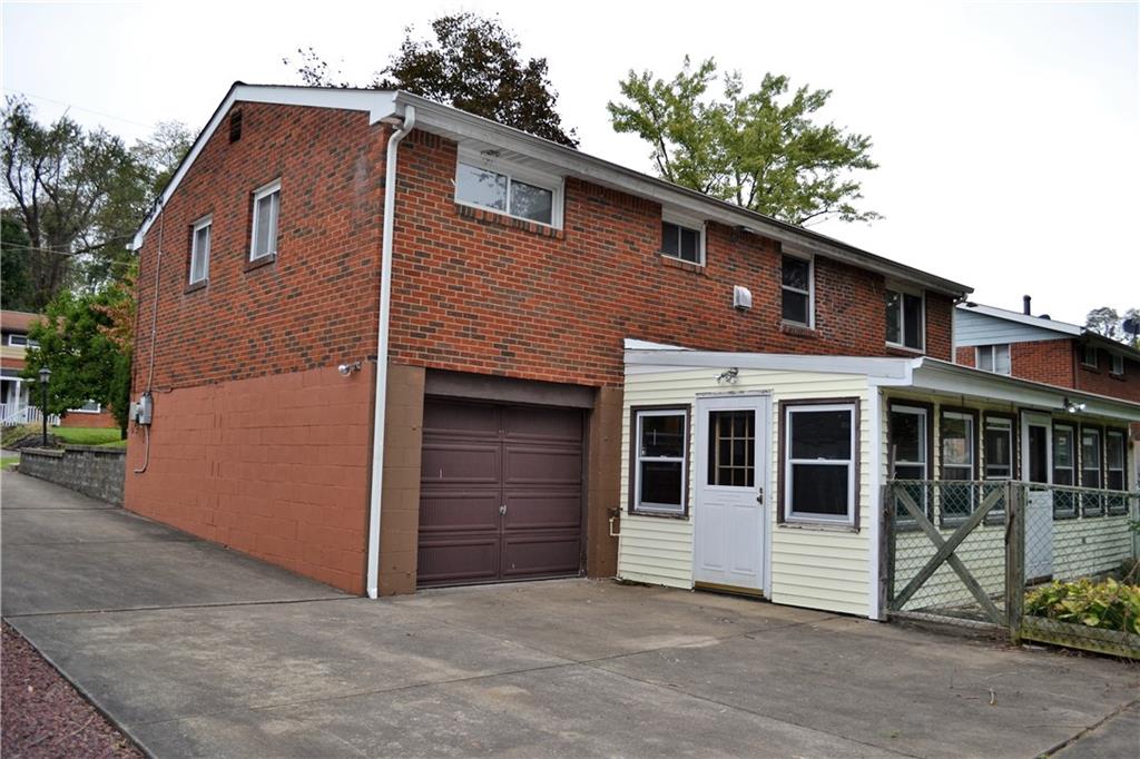 623 Snowball Road Monroeville, PA 15146 - Photo 21 of 23 EXTERIOR REAR: Plenty of additional off-street parking in addition to the one car integral garage.Also plenty of space for kids to play! Maybe install a basketball hoop over the garage?!