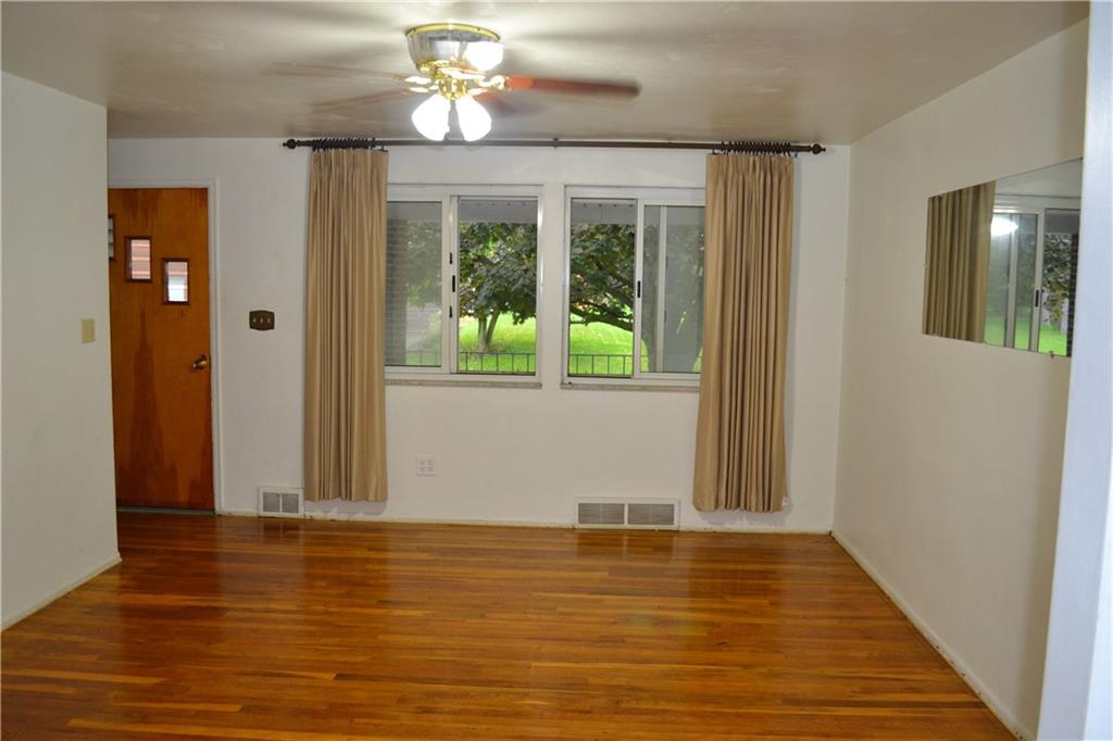 623 Snowball Road Monroeville, PA 15146 - Photo 4 of 23 LIVING ROOM All of the original genuine oak hardwood flooring throughout the full main level has been lovingly refinished. The front facing bay window welcomes in lots of natural light...