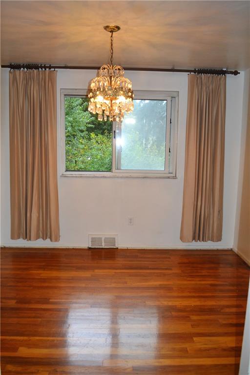 623 Snowball Road Monroeville, PA 15146 - Photo 9 of 23 DINING ROOM The dining room connects the living room and the kitchen and is accented by a beautiful vintage crystal chandelier that remains with the home....