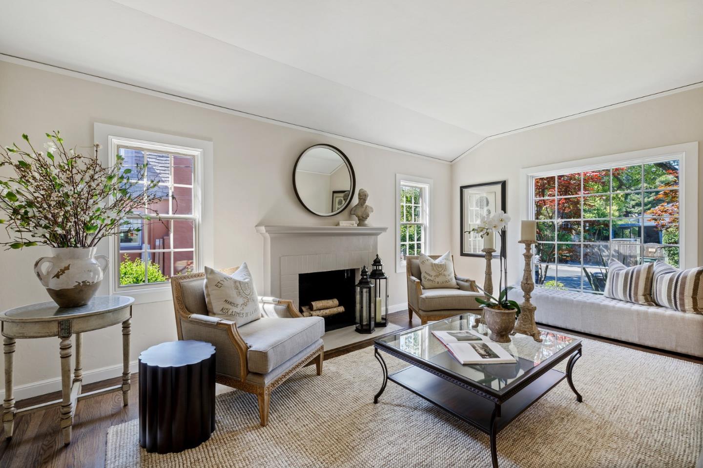 34 Channing Road Burlingame, CA 94010 - Photo 5 of 26 a living room with furniture a fireplace and a potted plant