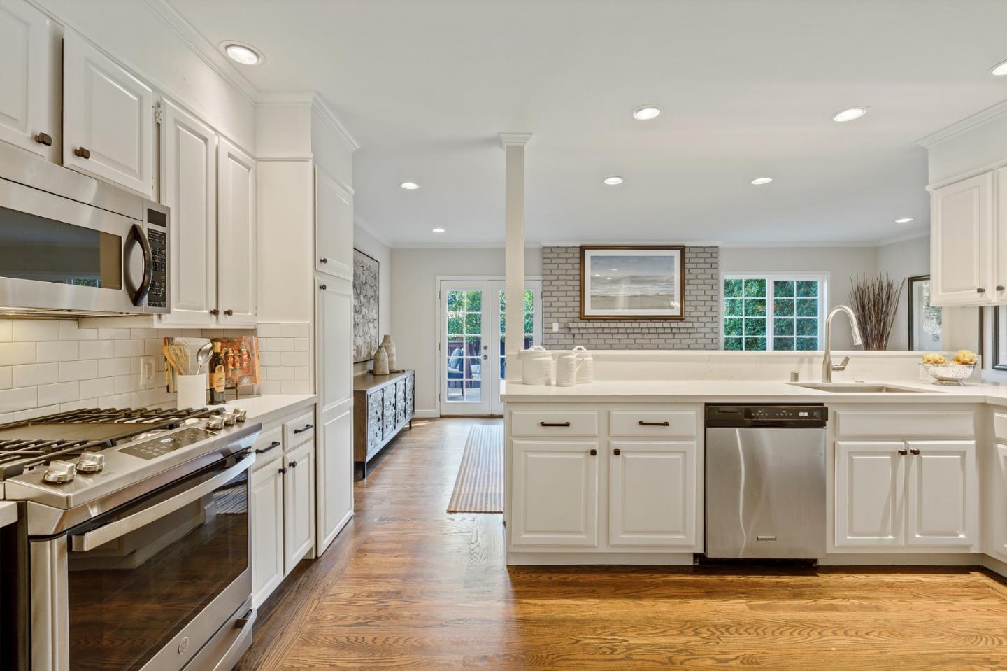 34 Channing Road Burlingame, CA 94010 - Photo 8 of 26 a large kitchen with stainless steel appliances granite countertop a stove and a sink