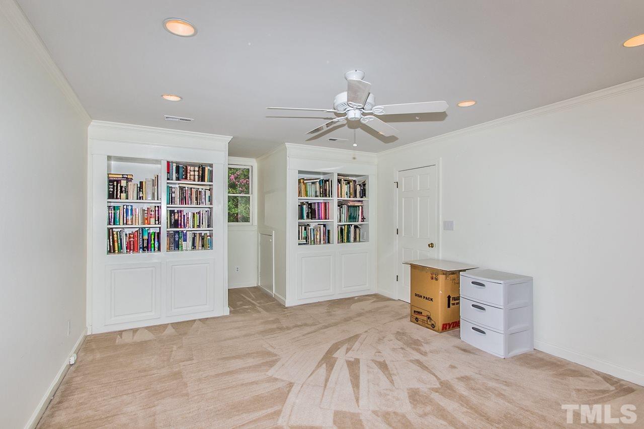 7619 Trowbridge Court Raleigh, NC 27613 - Photo 17 of 25 a view of an empty room with a window