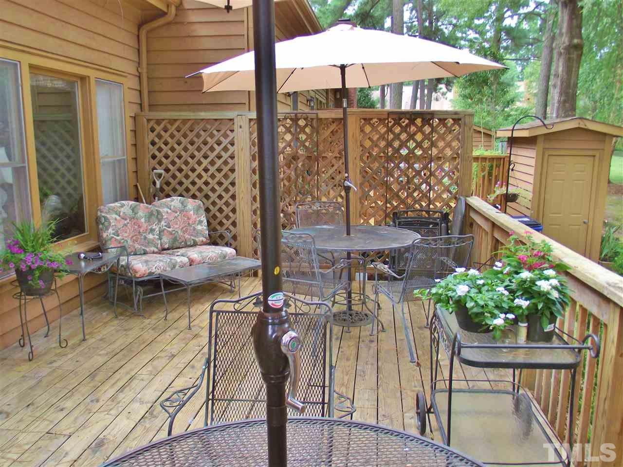 7619 Trowbridge Court Raleigh, NC 27613 - Photo 21 of 25 a garden view with a seating space