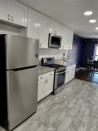 a view of a balcony with chairs