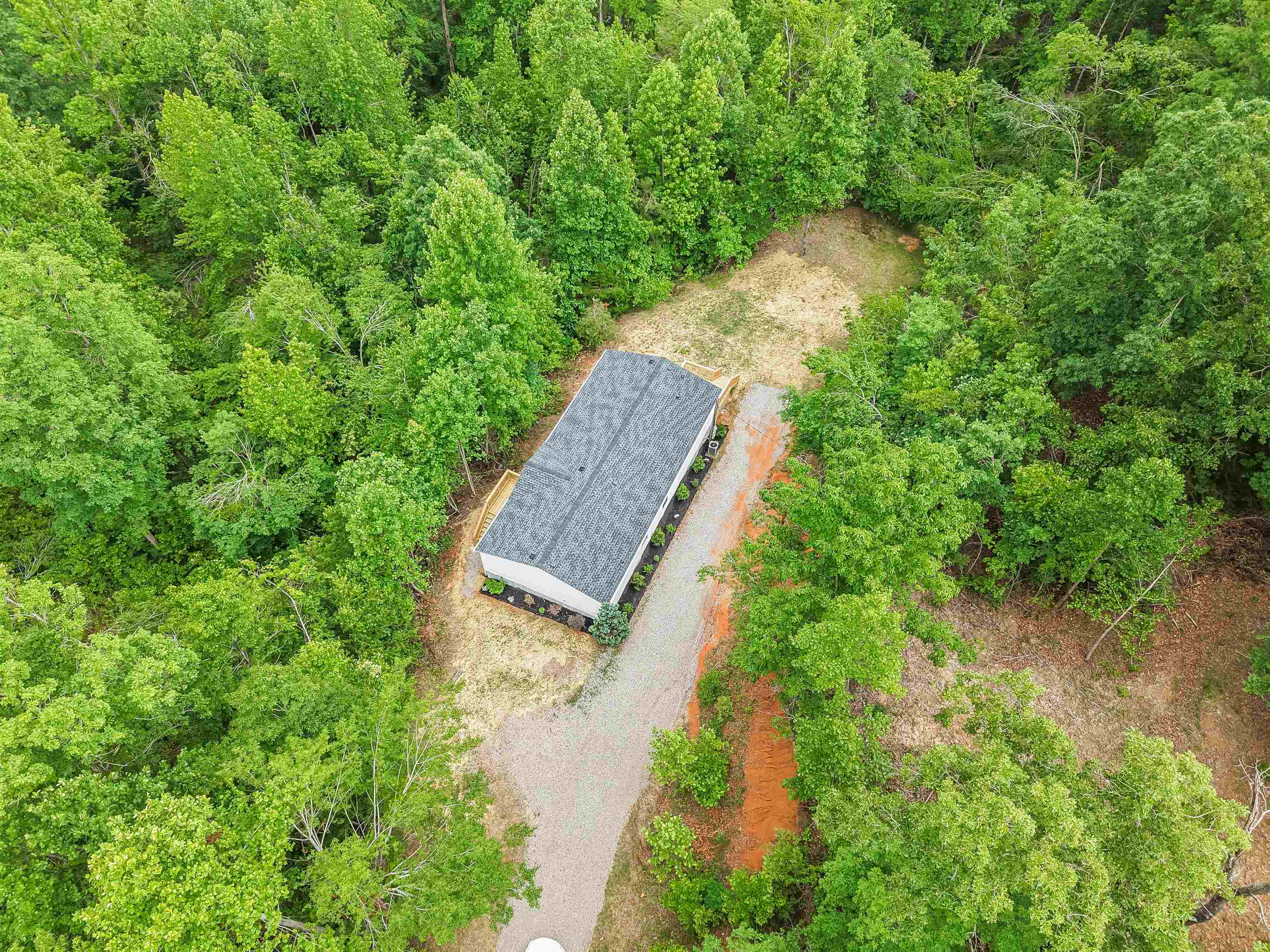 890 Burks Road Savannah, TN 38372 - Photo 32 of 40 a view of a garden with an outdoor space