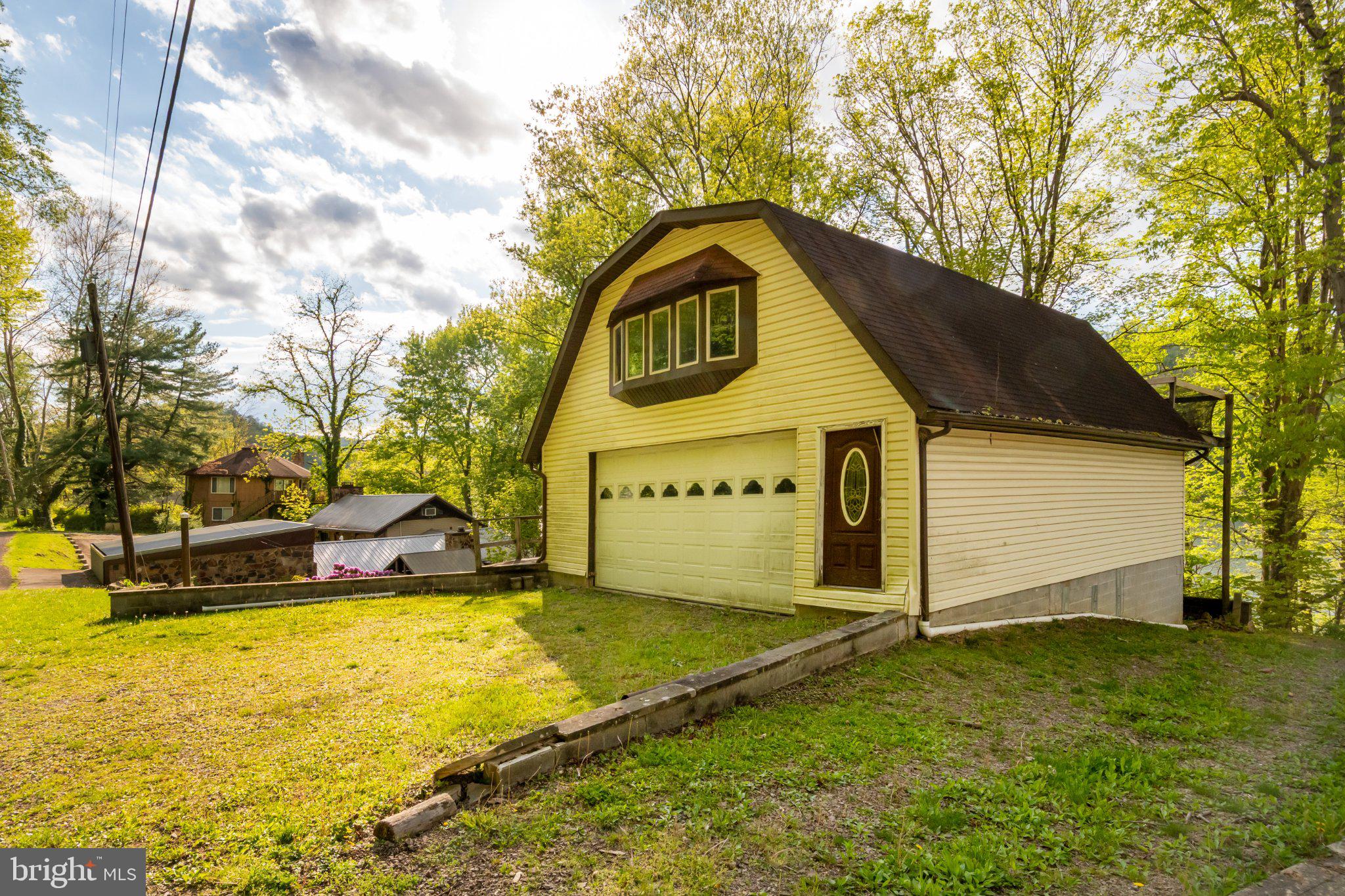 750 Lake Side Road Addison, PA 15411 - Photo 19 of 51 Charming home nestled in nature's embrace.
