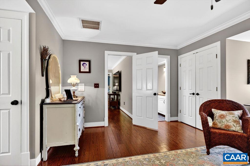 1059 Bryant Mountain Road Roseland, VA 22967 - Photo 33 of 58 a living room with furniture and a wooden floor