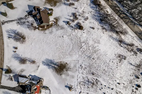 a view of water slide with sitting area