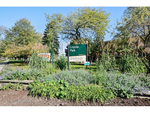 7031.5 North Sheridan Road, Unit 1N Chicago, IL 60626 - Photo 8 of 8 a view of a garden from a lake