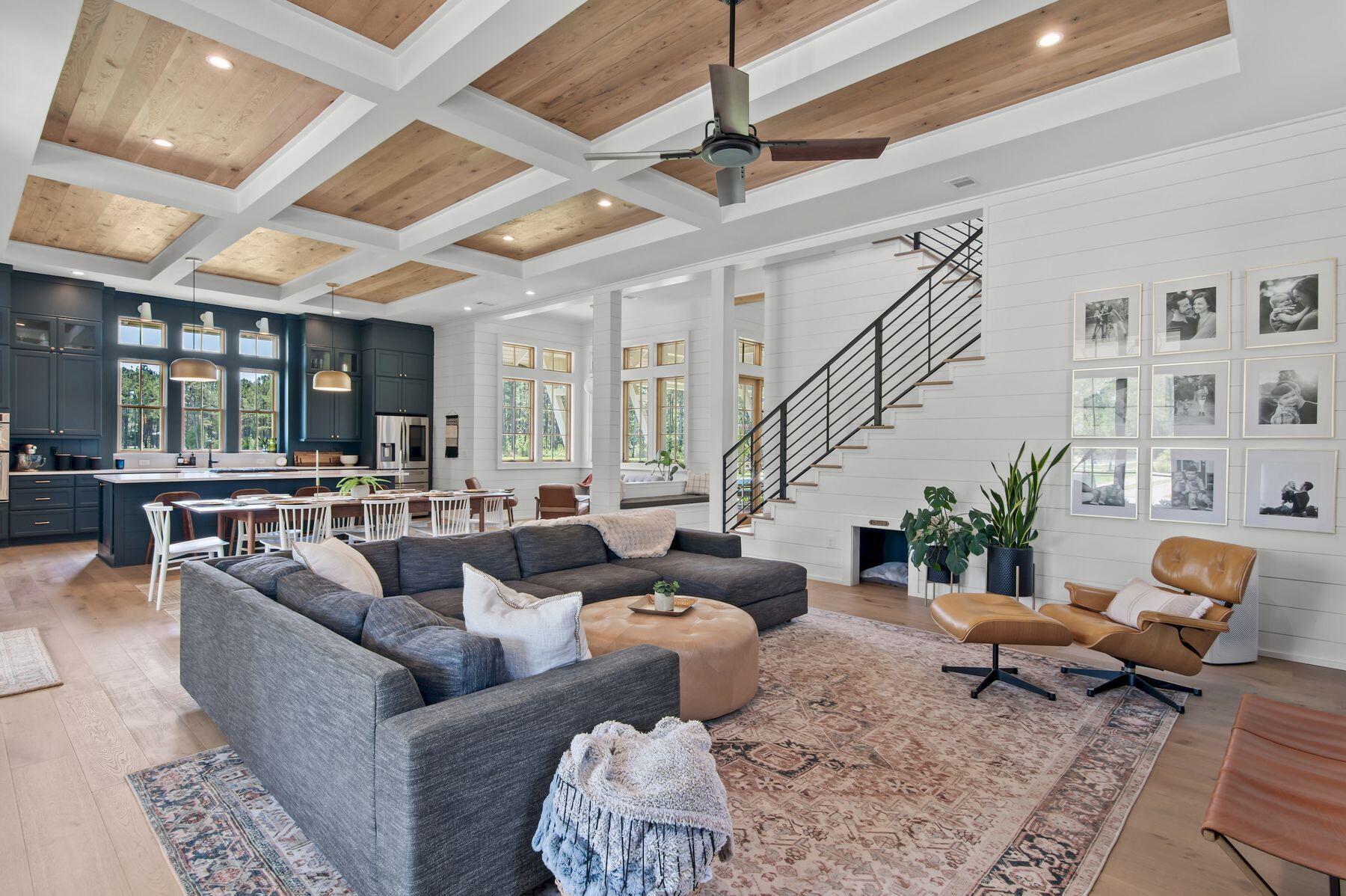 181 Jonathan Drive Freeport, FL 32439 - Photo 16 of 59 a living room with furniture or couches and a dining table with kitchen view