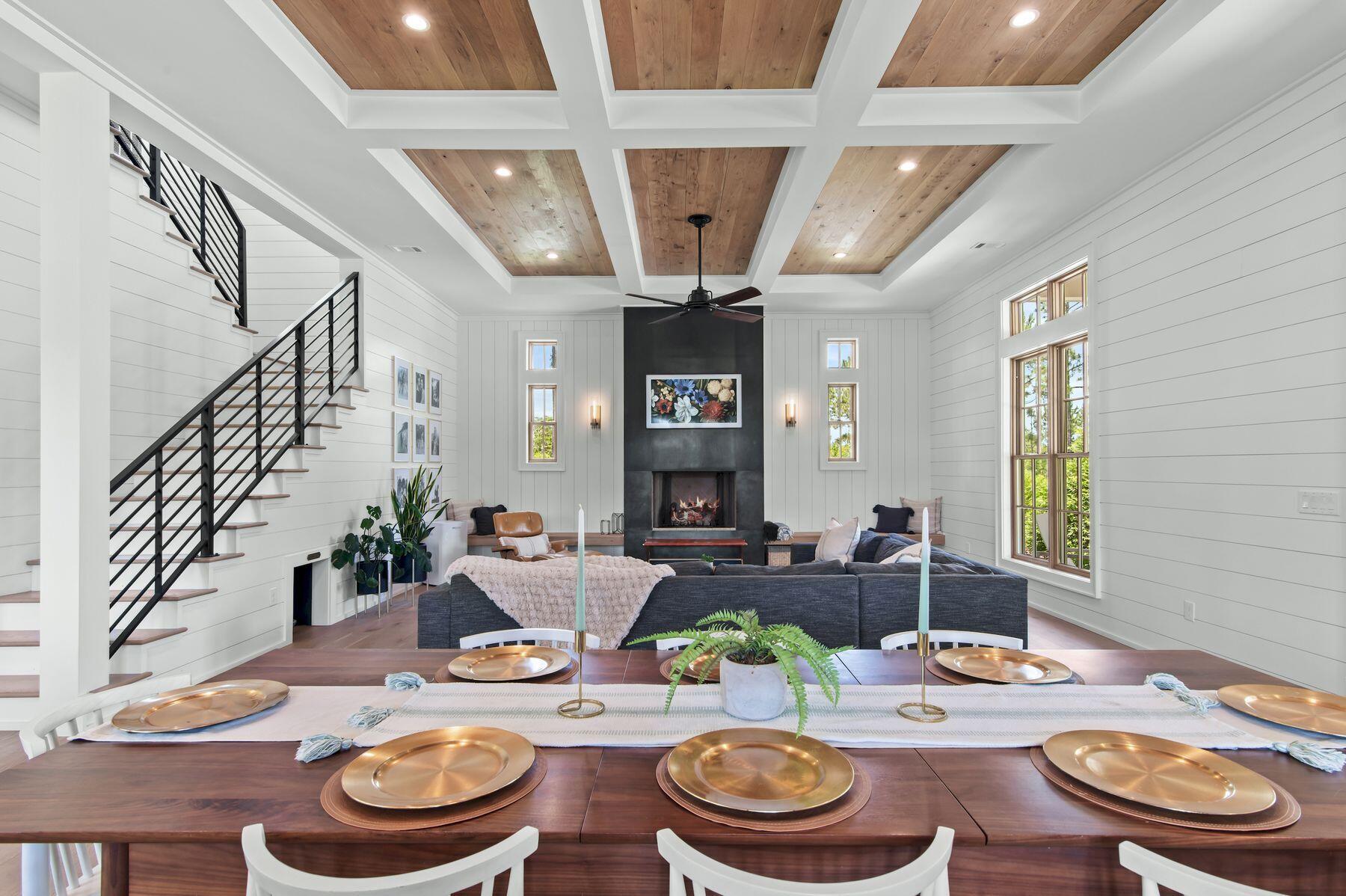 181 Jonathan Drive Freeport, FL 32439 - Photo 19 of 59 a dining room with furniture a rug and wooden floor