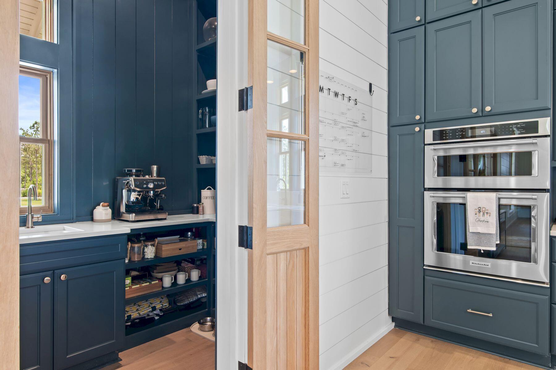181 Jonathan Drive Freeport, FL 32439 - Photo 28 of 59 a kitchen with stainless steel appliances granite countertop a refrigerator and a stove top oven