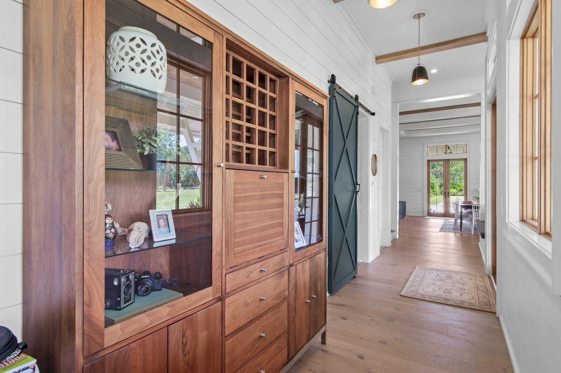 181 Jonathan Drive Freeport, FL 32439 - Photo 29 of 59 view of hall way with mirror and stairs