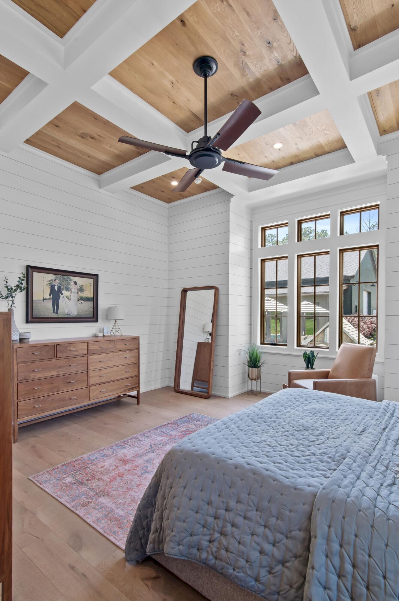 181 Jonathan Drive Freeport, FL 32439 - Photo 31 of 59 a bedroom with a large bed and a large window