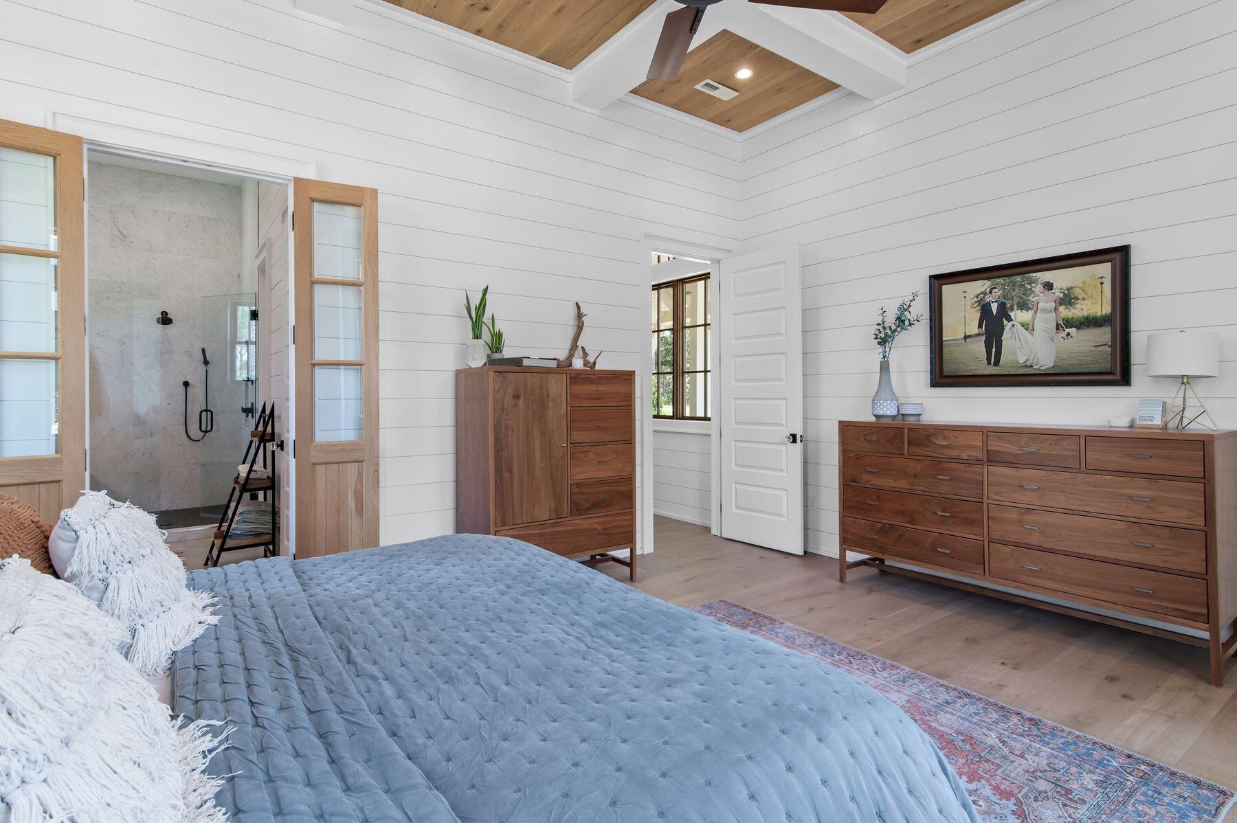 181 Jonathan Drive Freeport, FL 32439 - Photo 32 of 59 a bedroom with a bed and a dresser