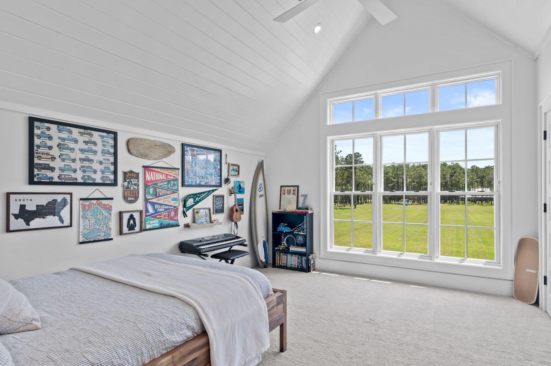 181 Jonathan Drive Freeport, FL 32439 - Photo 39 of 59 a bedroom with a bed and a large window