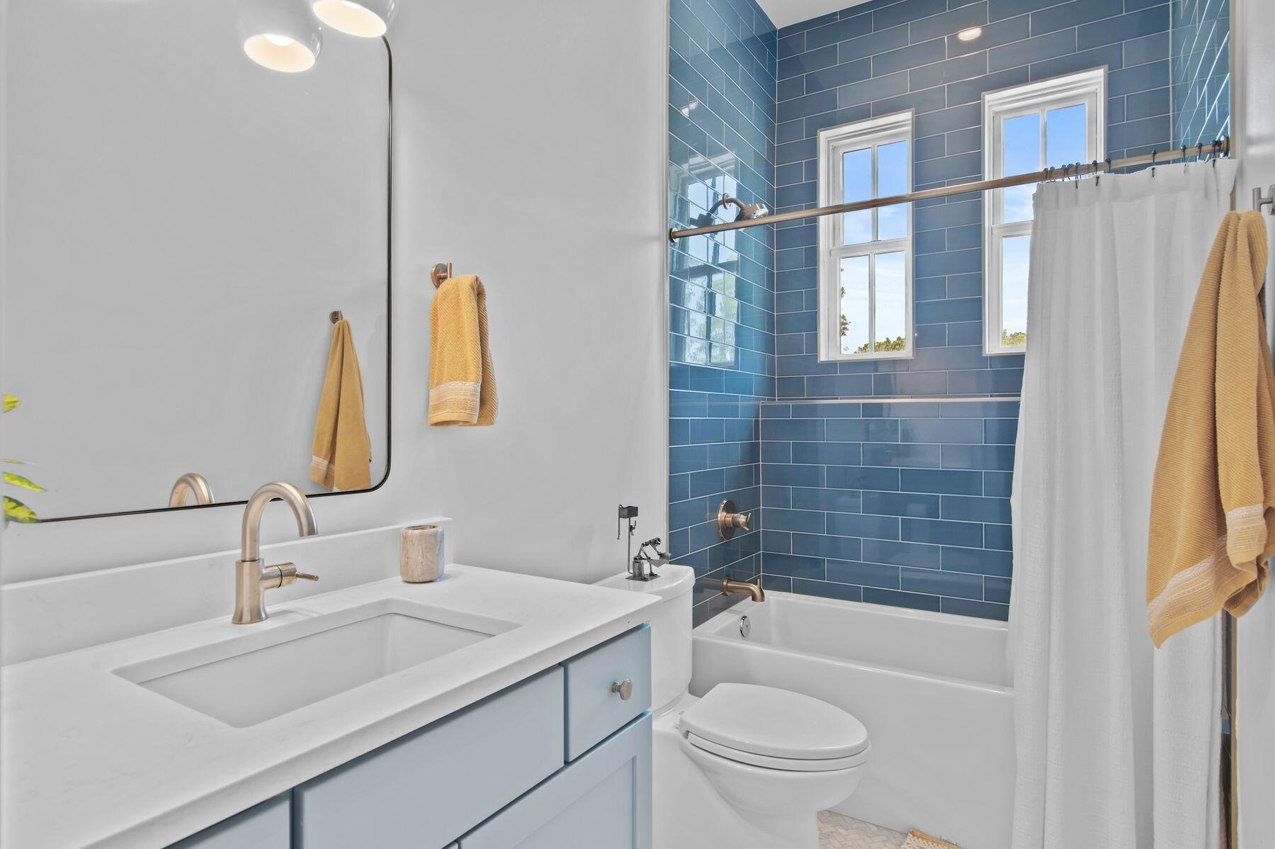 181 Jonathan Drive Freeport, FL 32439 - Photo 41 of 59 a bathroom with a sink toilet and shower