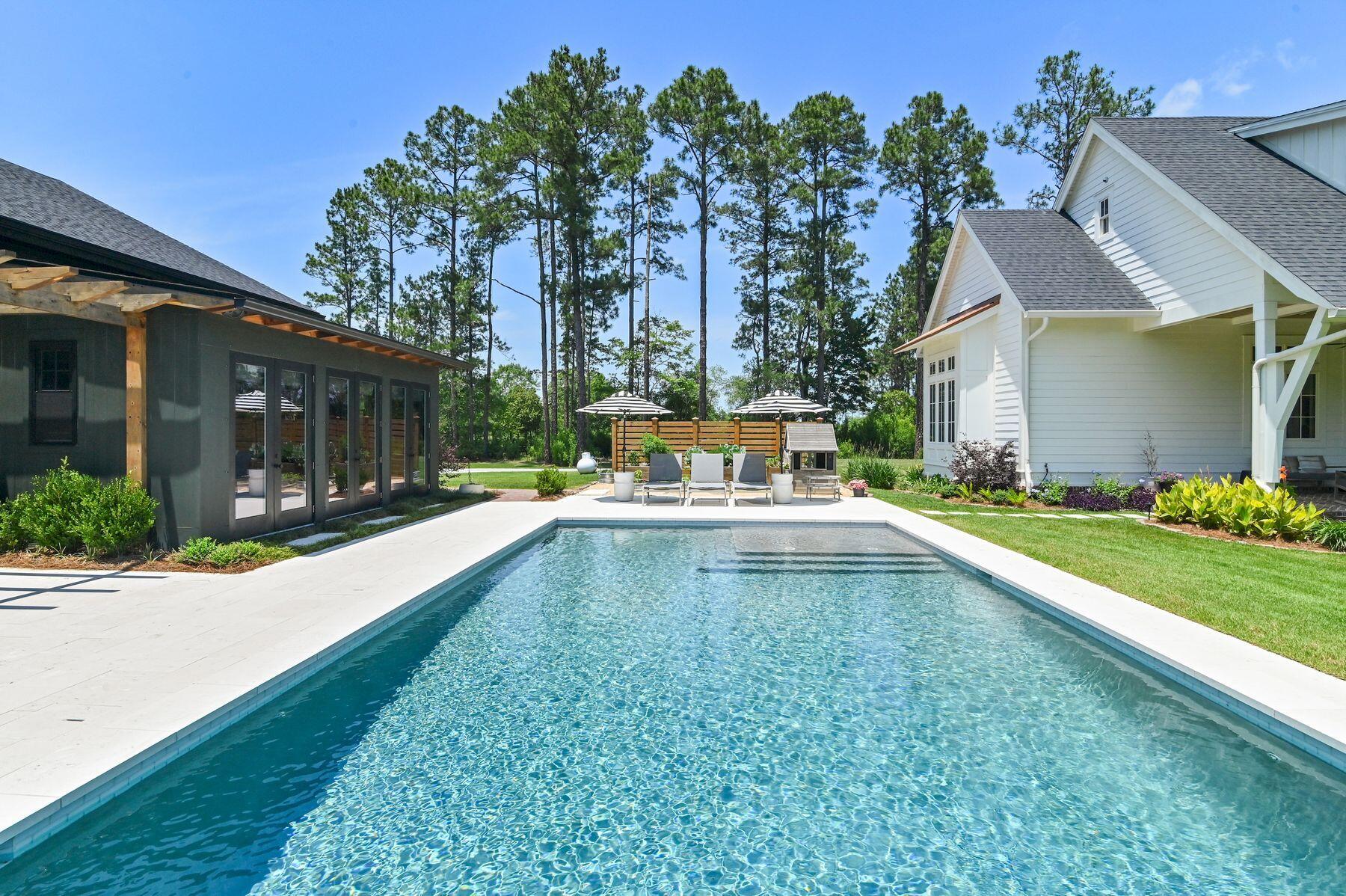 181 Jonathan Drive Freeport, FL 32439 - Photo 7 of 59 a view of a swimming pool with a patio