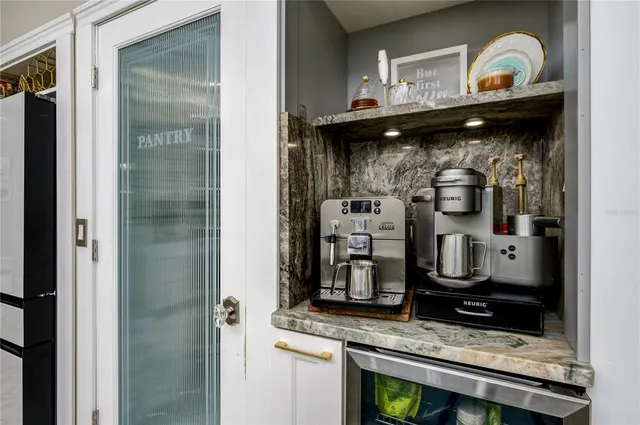 a spacious bedroom with a bed and a couch