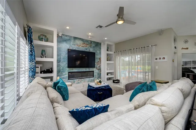 a view of livingroom with furniture and workspace