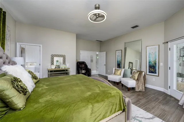 a view of staircase with wooden floor and a window