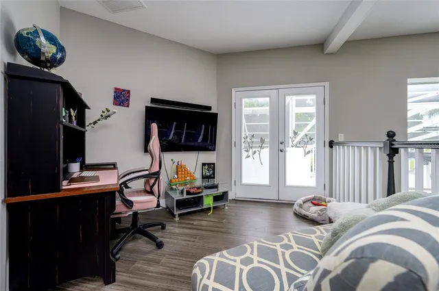 a outdoor space with patio furniture and potted plants
