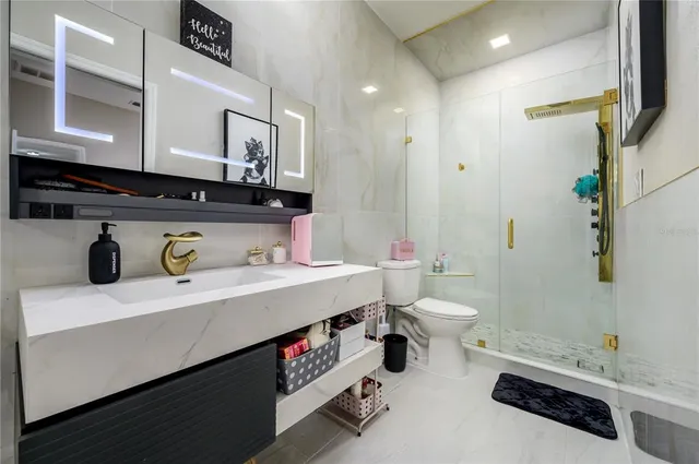 an outdoor space with swimming pool and furniture