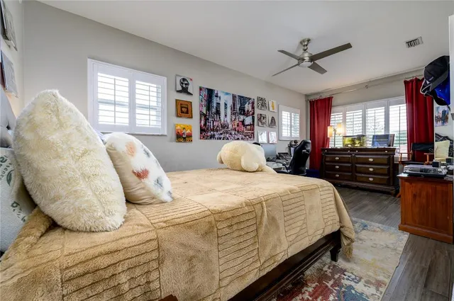 a backyard of a house with outdoor seating