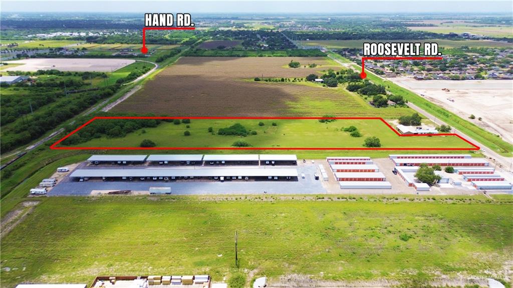 2605 Roosevelt Road Harlingen, TX 78552 - Photo 5 of 5 a view of swimming pool with a yard and outdoor seating