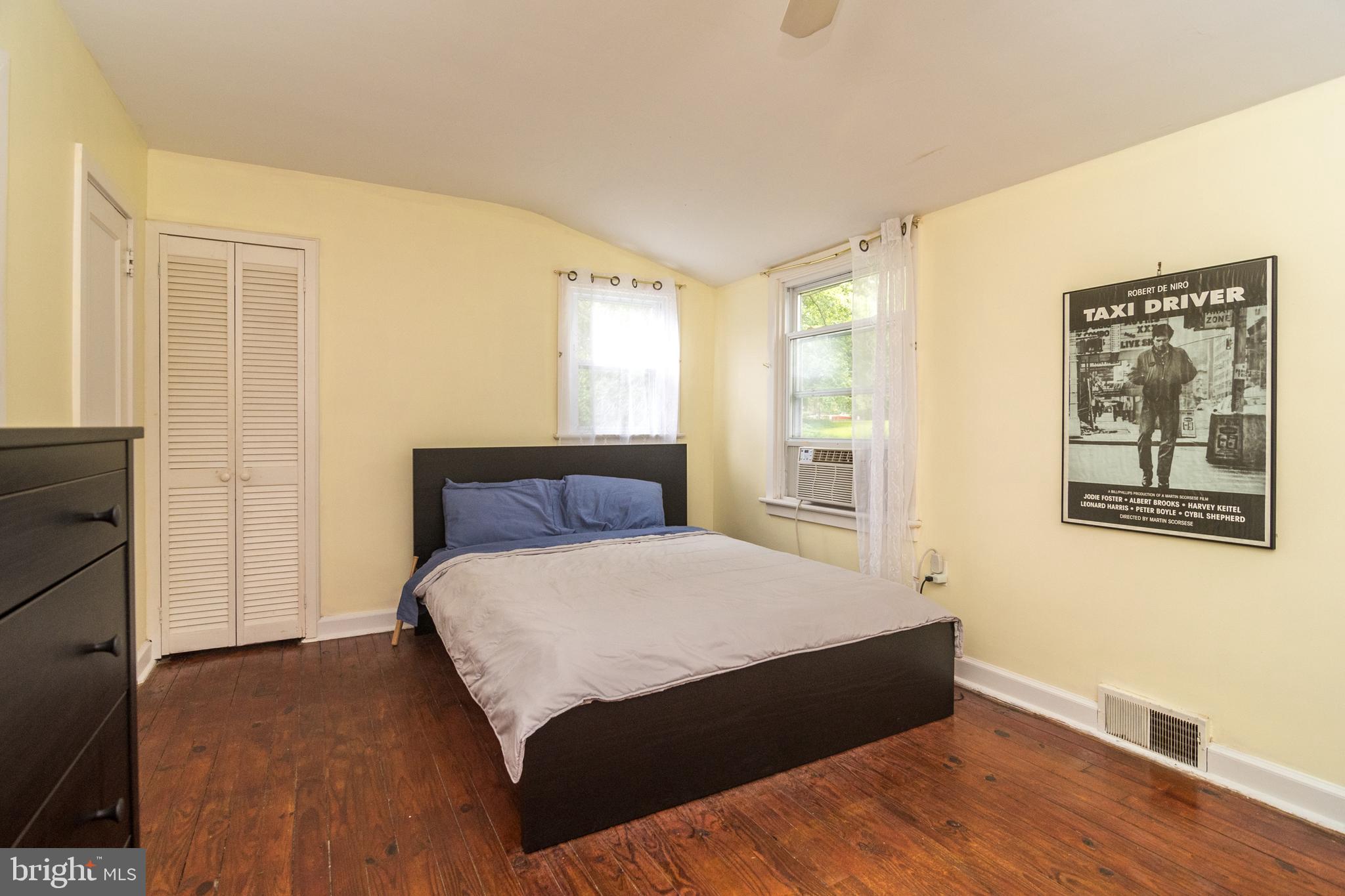 28 Church Road Cheltenham, PA 19012 - Photo 22 of 30 a bedroom with a bed and wooden floor