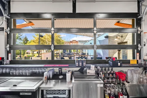 a view of livingroom with hardwood floor and hallway