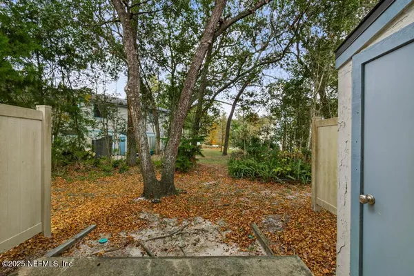 a view of a garden with trees