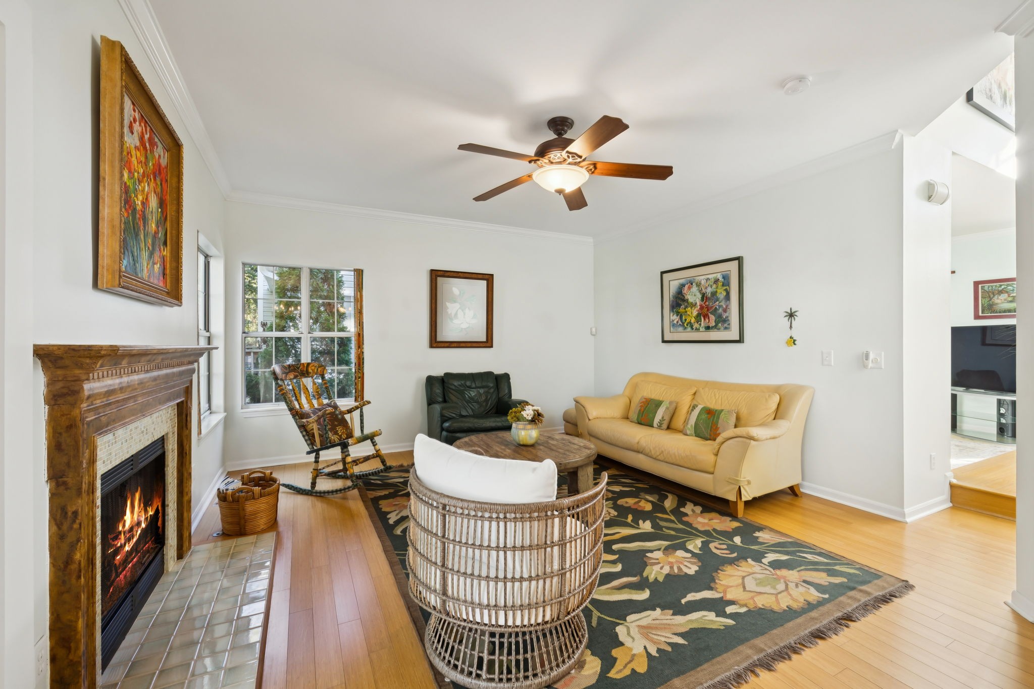 148 Cavalcade Circle Franklin, TN 37069 - Photo 12 of 43 a living room with furniture a fireplace and a flat screen tv