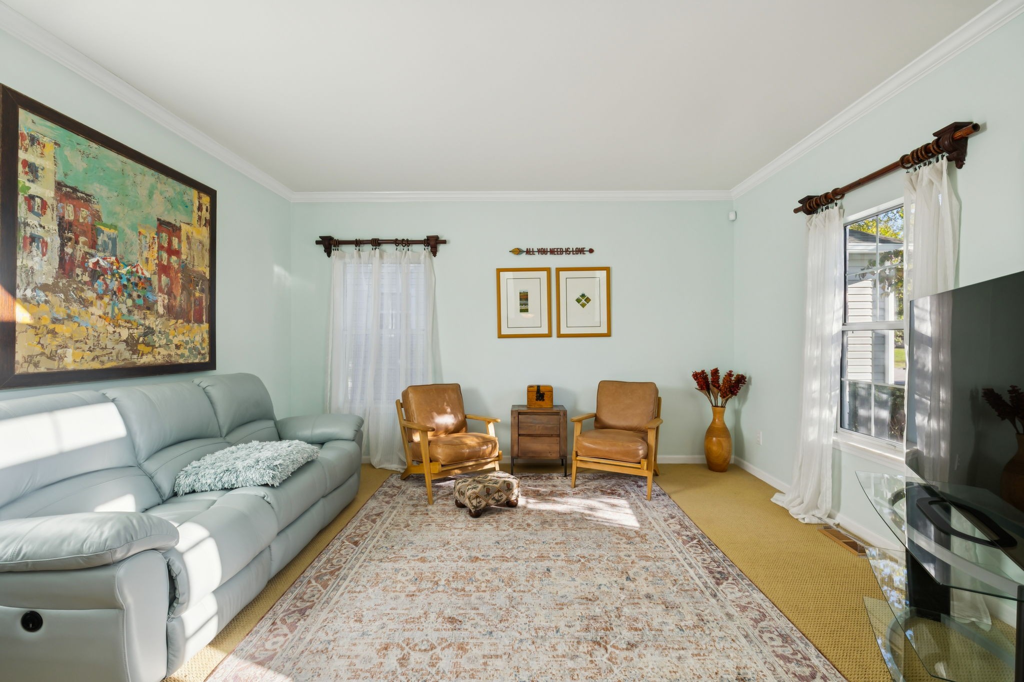 148 Cavalcade Circle Franklin, TN 37069 - Photo 7 of 43 a living room with furniture a couch and a flat screen tv