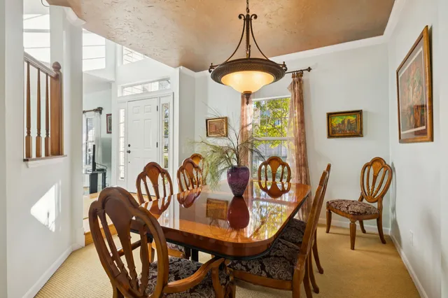 a view of a dining room with furniture