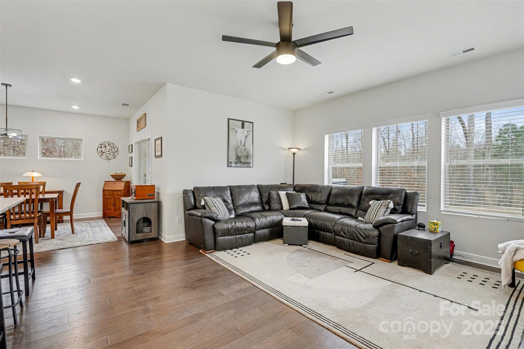 6220 Hailstone Road Charlotte, NC 28215 - Photo 14 of 37 a living room with furniture and a large window