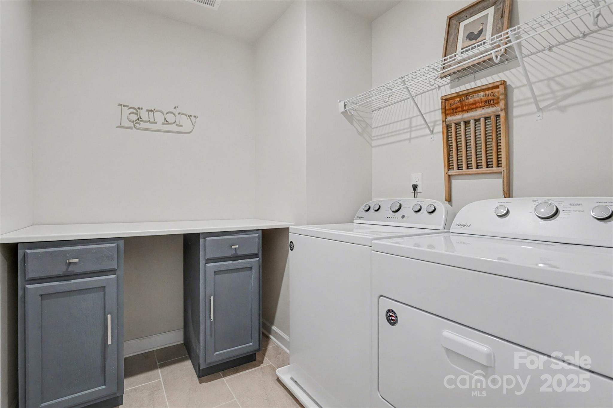 6220 Hailstone Road Charlotte, NC 28215 - Photo 21 of 37 a bathroom with a sink and a mirror