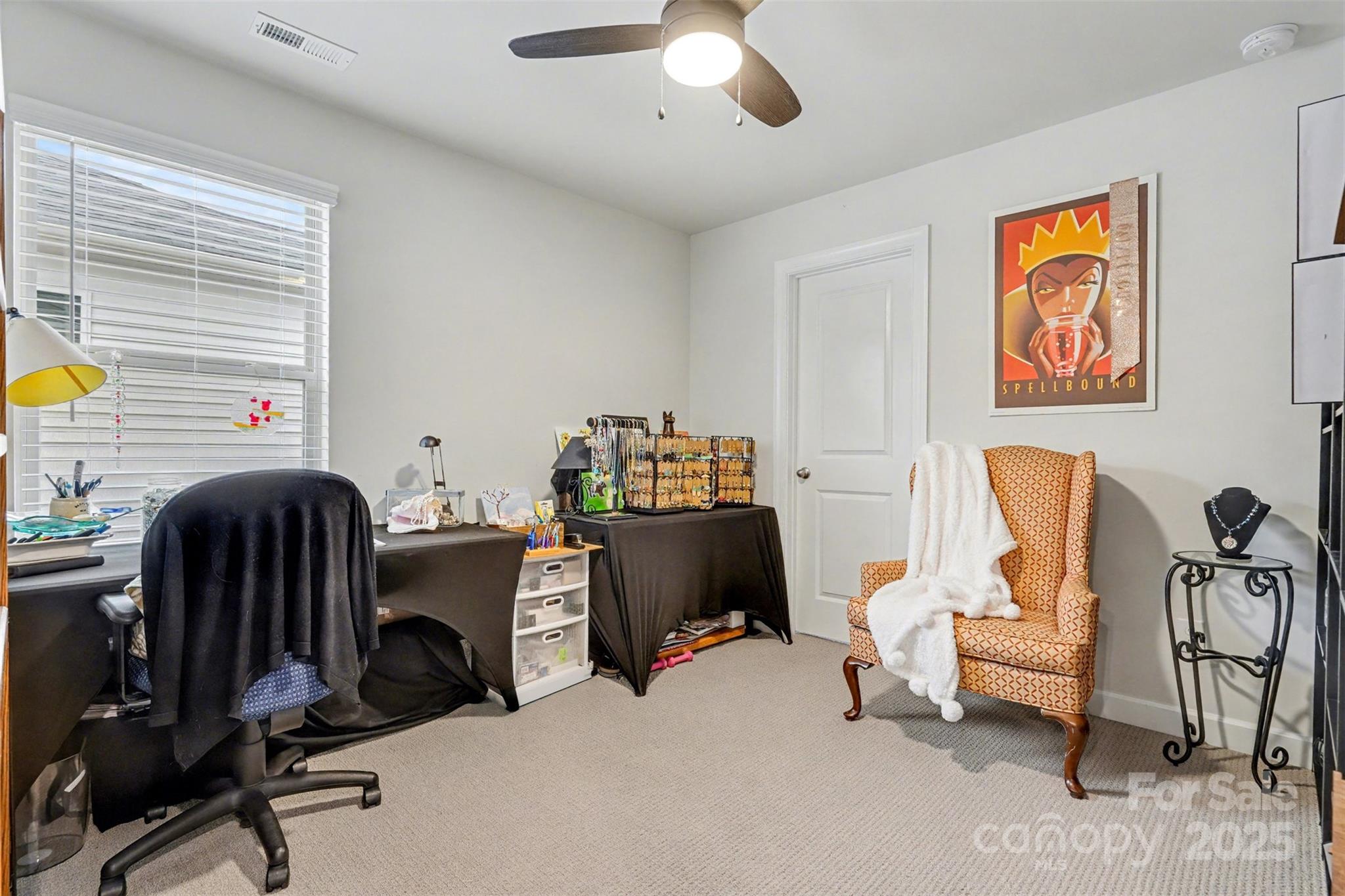 6220 Hailstone Road Charlotte, NC 28215 - Photo 25 of 37 a view of a workspace with furniture and a window