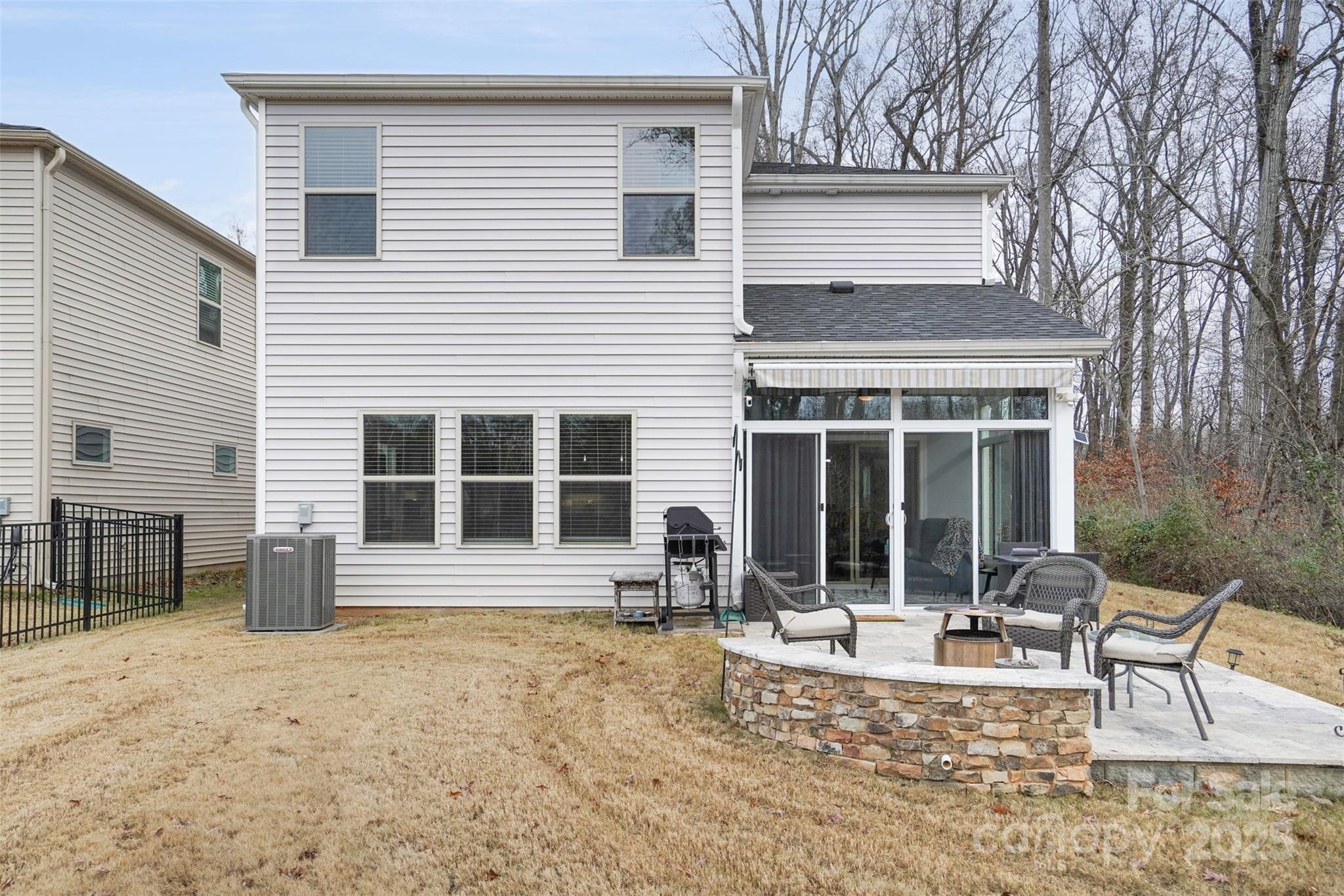 6220 Hailstone Road Charlotte, NC 28215 - Photo 29 of 37 a view of a house with backyard and sitting area