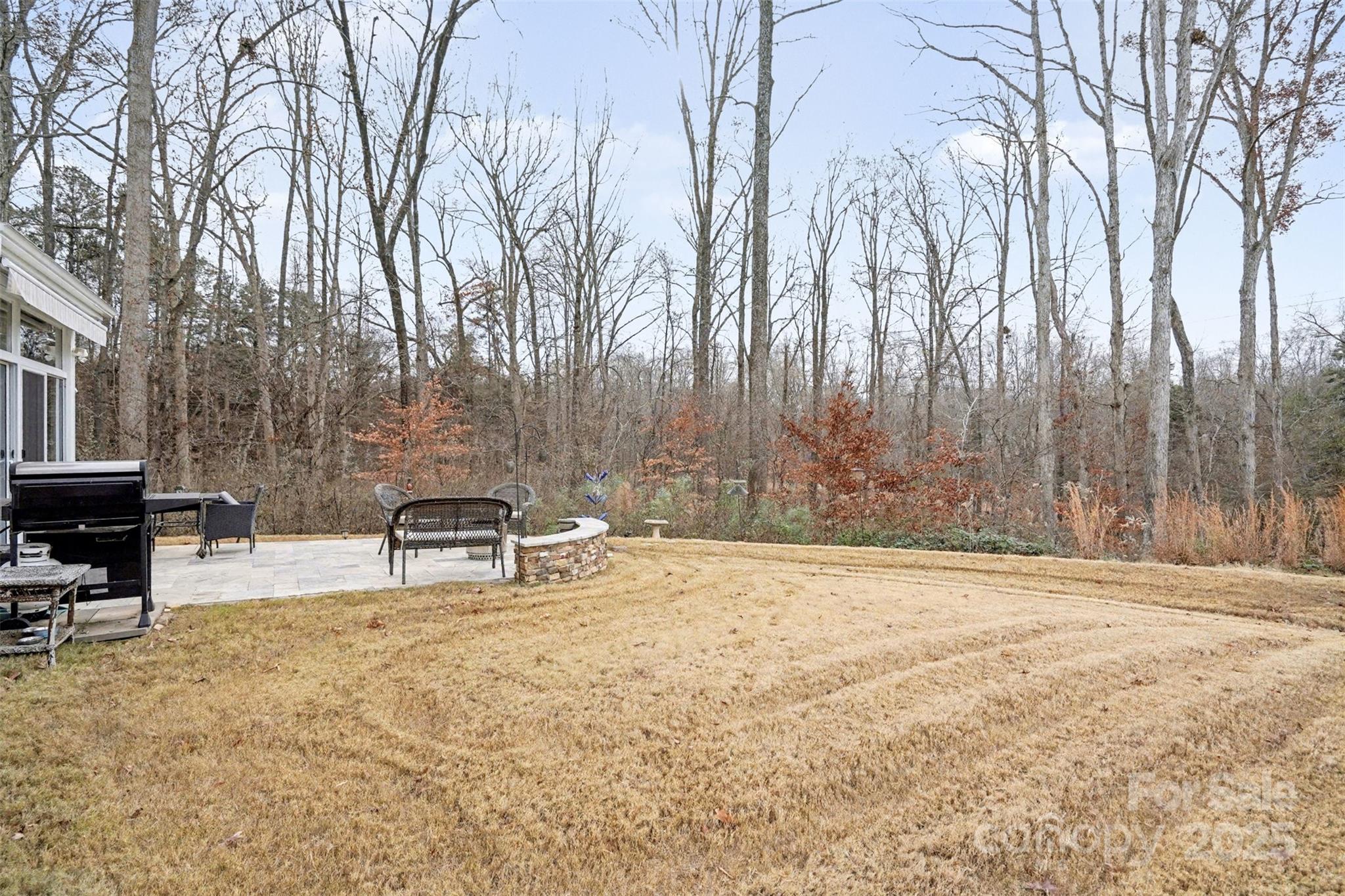 6220 Hailstone Road Charlotte, NC 28215 - Photo 30 of 37 a view of a backyard with chairs
